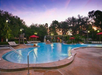 Outdoor pool area at night.
