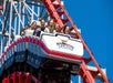 A car full of people starting to go  downhill on the Steel Force roller coaster at Dorney Park in Allentown, Pennsylvania.