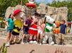 A family enjoys a visit with several of the beloved Peanuts characters in Planet Snoopy at Dorney Park in Allentown, PA