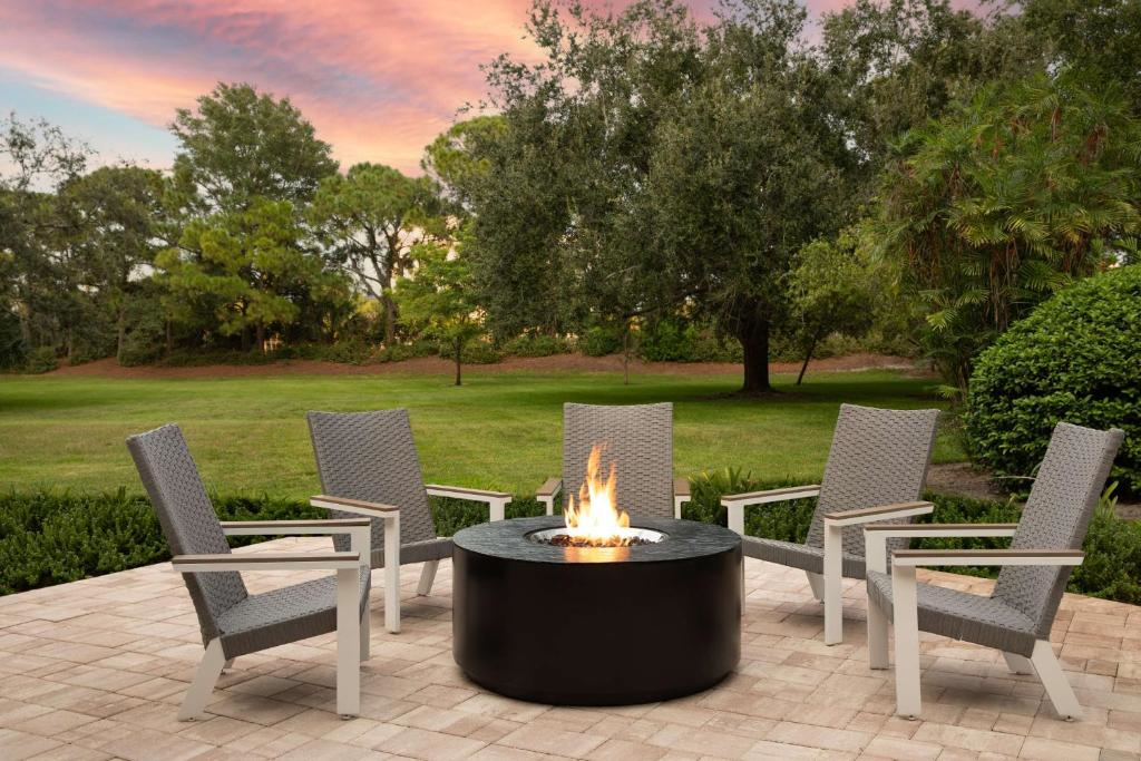 Outdoor lounge/patio with a firepit.