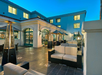 Unwind in the outdoor patio with soft seating.