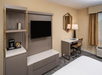 Flat-screen TV, work desk, coffee/tea machine at DoubleTree by Hilton St. Augustine Historic District, FL.