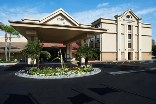 Beautiful landscaped hotel exterior.
