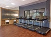 Stay fit at the fitness center onsite.