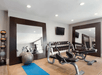 Fitness facility with big mirrors.
