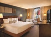 One king bed inside a guest room.