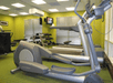 Fitness room with treadmills, and other cardio equipment, and weights.