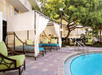 Outdoor pool and cabana at Fairfield Inn & Suites by Marriott Key West. 
