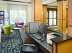 Business center with one computer and printer.