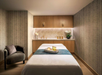 The spa features a comfortable massage bed for a relaxing experience.