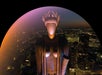 A large Art Deco statue overlooks a cityscape at dusk, illuminated by city lights and a gradient arc of purple and orange in the foreground.