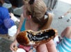 A close up of the deep fried oreo this guest is eating at one of the stops on the Food on Foot Midtown Mix Guided NYC Tour New York CIty, New York.