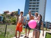 Guests walking on the boardwalk from the resort building to the beach.