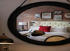 A king bed, ornate tiled walls, and artwork inspired by The Foundry's inception