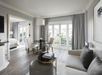 Relax in a seating area with plush furniture and a well-placed table.