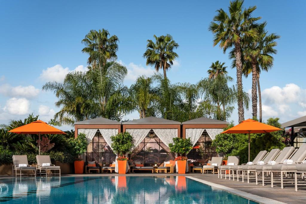 Outdoor pool offering a tranquil retreat under the sun.