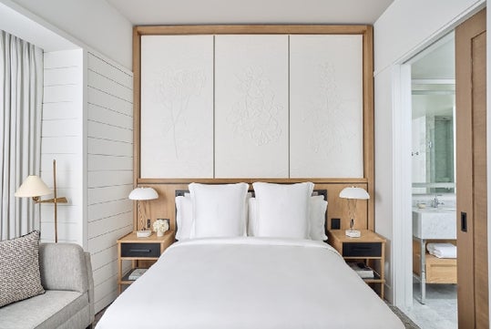 Fresh, crisp and modernly designed bedroom at Four Seasons New Orleans.