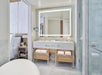 Marble bathroom with double vanity sinks at Four Seasons New Orleans.