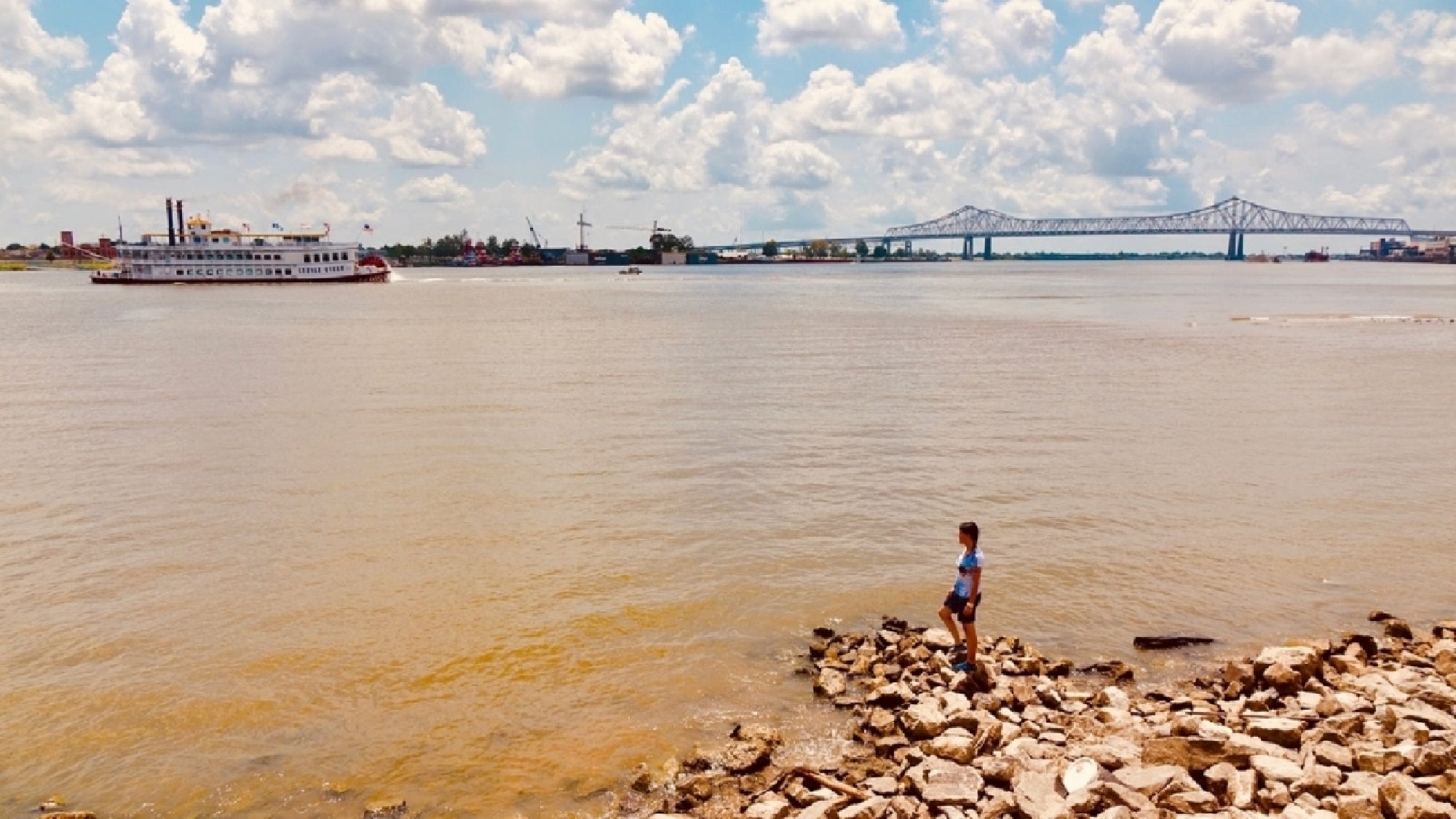 Riverboat cruising past the city’s historic waterfront.