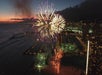 Fireworks are being shot over the Waikiki beach in Waikiki, Hawaii.