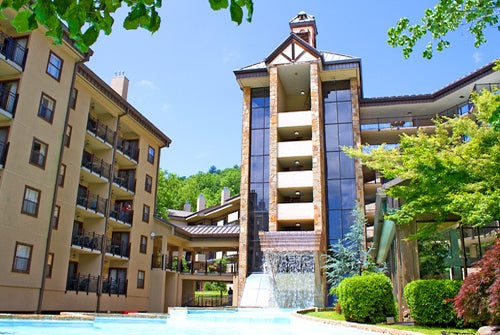 Gatlinburg Town Square outdoor pool area with a waterfall feature.