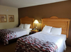 Two beds inside a non-smoking guest room.