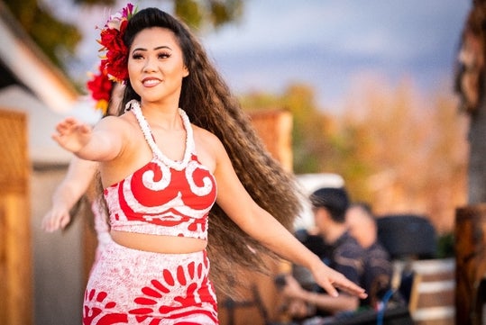 Luau dancer performing at Gilligans' Island Luau at Maui Nui Golf Club