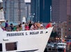 People aboard the historic sightseeing cruise boat named Frederick L. Nolan Jr. in Boston with Go City - Boston All-Inclusive Pass.