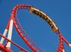 Several people enjoying a rollercoaster ride at Big Apple Roller Coaster at NY, NY Hotel with Go Las Vegas Explorer Pass.