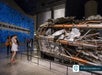 Visitors explore the room where the wreckage of the communications antenna of the North Tower of the World Trade Center is on display at the 9/11 Memorial Museum in New York City, USA. 