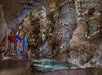 A family with a tour guide at Natural Bridge Caverns with Go San Antonio Explorer Pass.