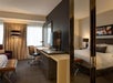 One king bed, flat-screen TV and an expanded window with city views.