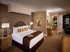 Spacious guest room with one bed.