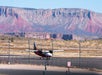 Scenic flight plane on remote desert airfield.