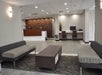 Hotel lobby, front desk and business center at Grand Hotel Kissimmee.