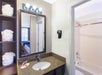 Guest bathroom with bathtub and shower combination.