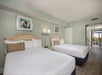 Guest room with two queen beds. 