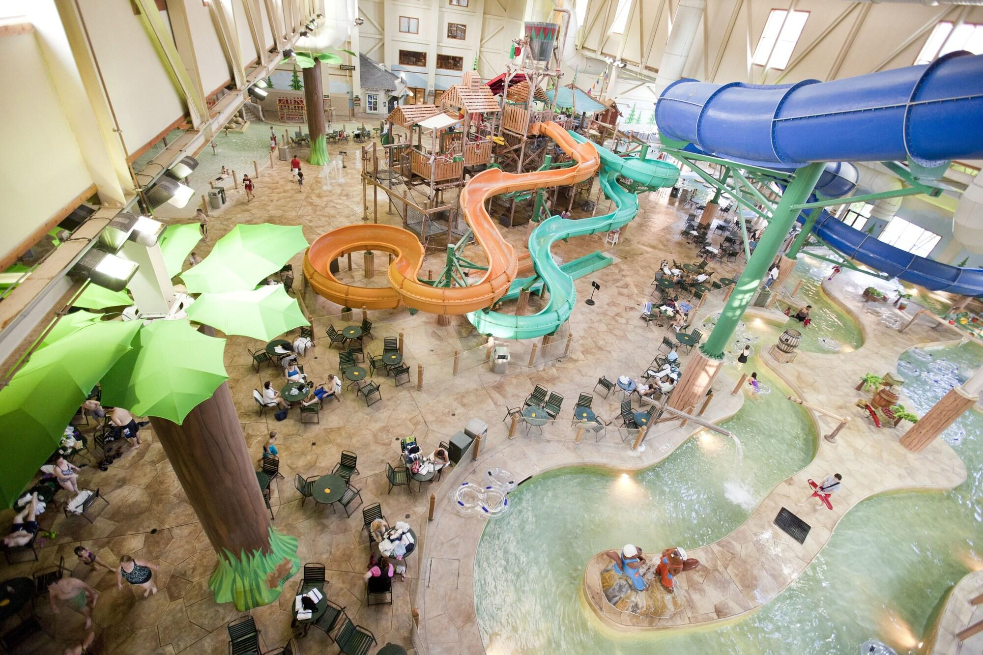 Waterpark with lazy river and multiple waterslides.