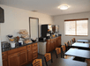 Breakfast area with variety of breakfast items.