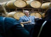 The guide telling the group about the wine on the Half Day Wine Country Experience in San Francisco California USA.