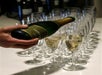 Someone pouring champaign on the Half Day Wine Country Experience in San Francisco California USA.