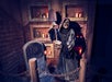 A scareactor holding a shovel inside the Monstruous haunted house at Universal Studios Hollywood's Halloween Horror Nights.