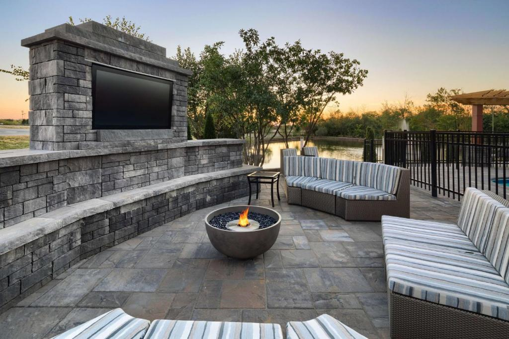 Cozy up by the warm and inviting firepit.