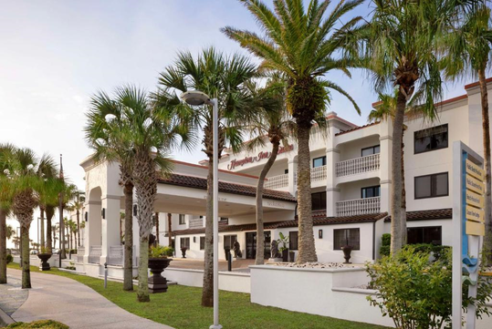 The hotel's exterior presents a welcoming and well-maintained appearance.