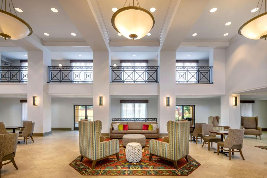 The lobby area offers a warm and inviting space to relax or wait comfortably.