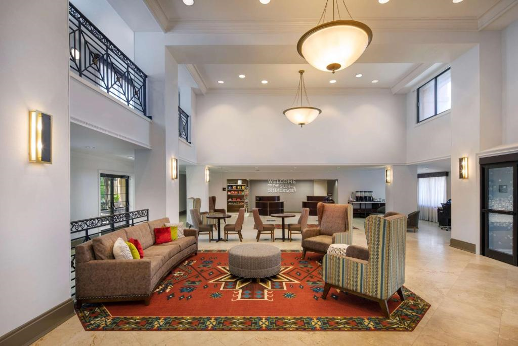 Unwind in the stylish lobby area featuring cozy seating and a relaxed atmosphere.