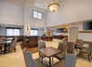 The breakfast area offers a comfortable space to enjoy your morning meal.