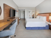 Enjoy a comfortable stay with a plush king bed, convenient workspace, and in-room entertainment.