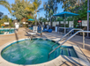 Unwind in the soothing hot tub with pool lift.