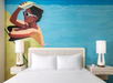 1 King bed and bedside lamps inside a guest room.